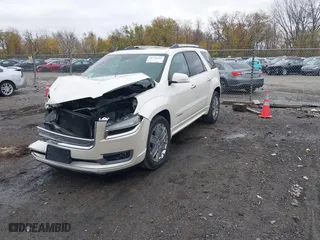 2014 GMC Acadia Denali with VIN 1GKKVTKD2EJ271871, listed as a IAAI auction lot 41699704 with 177,496 mi miles. Bid and sale history available at carsss.com. Image 2.