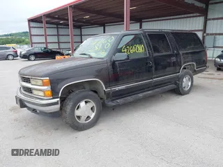 1999 Chevrolet Suburban with VIN 3GNFK16R4XG232727, listed as a IAAI auction lot 42602810 with 121,395 mi miles and . Bid and sale history available at DreamBid. Image 2.