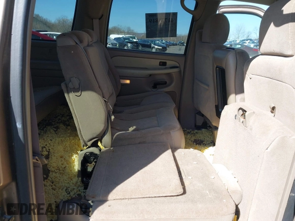 2003 Chevrolet Suburban LT z VIN 1GNFK16ZX3J197314, wystawiony jako IAAI lot #41771819 z przebiegiem 233 849 mil mil oraz . Historia ofert i sprzedaży dostępna na DreamBid. Obrazek 8.