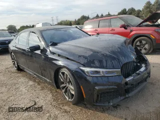 2020 BMW 7 Series with VIN WBA7U6C05LBM63050, listed as a Copart auction lot 71823944 with Not provided miles and Salvage title. Bid and sale history available at DreamBid. Image 4.