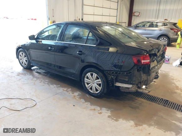 2017 Volkswagen Jetta 1.4T S with VIN 3VW167AJ5HM329706, listed as a IAAI auction lot 40801058 with 144,103 mi miles. Bid and sale history available at carsss.com. Image 3.