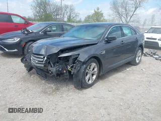2015 Ford Taurus SEL with VIN 1FAHP2E81FG122378, listed as a IAAI auction lot 42081001 with 159,853 mi miles and . Bid and sale history available at carsss.com. Image 2.