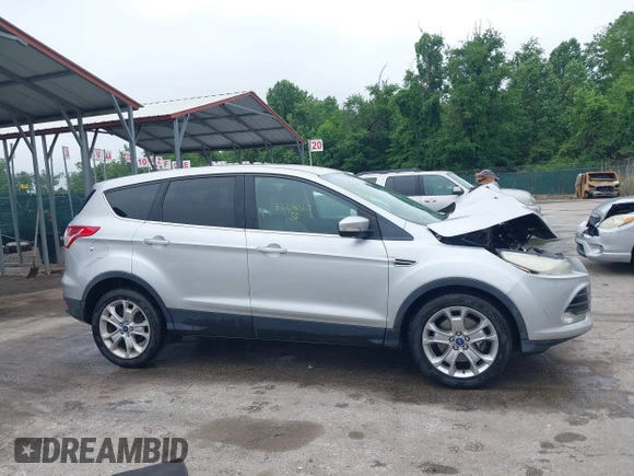 2013 Ford Escape SEL z VIN 1FMCU9H97DUA34665, wystawiony jako IAAI lot #42258567 z przebiegiem 174 227 mil mil oraz . Historia ofert i sprzedaży dostępna na DreamBid. Obrazek 13.