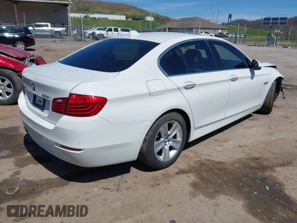 2015 BMW 5 Series 528i xDrive with VIN WBA5A7C54FG143565, listed as a IAAI auction lot 41948957 with 107,255 mi miles and . Bid and sale history available at carsss.com. Image 4.