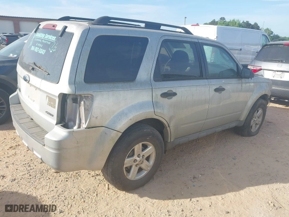 2009 Ford Escape XLT with VIN 1FMCU93G29KC41151, listed as a IAAI auction lot 42078509 with 238,350 mi miles. Bid and sale history available at carsss.com. Image 4.