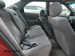 1998 Toyota Camry LE z VIN JT2BG22K6W0179063, wystawiony jako Copart lot #56998295 z przebiegiem 251 129 mil mil oraz Szkoda całkowita • Salvage title. Historia ofert i sprzedaży dostępna na DreamBid. Obrazek 10.