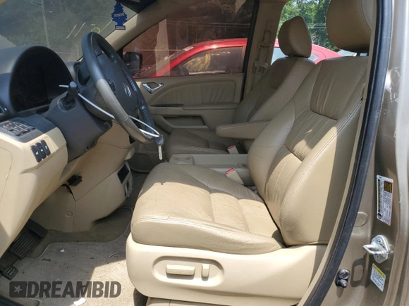 2008 Honda Odyssey Touring z VIN 5FNRL38968B025520, wystawiony jako Copart lot #60799645 z przebiegiem 116 592 mil mil oraz Szkoda całkowita • Salvage title. Historia ofert i sprzedaży dostępna na DreamBid. Obrazek 7.