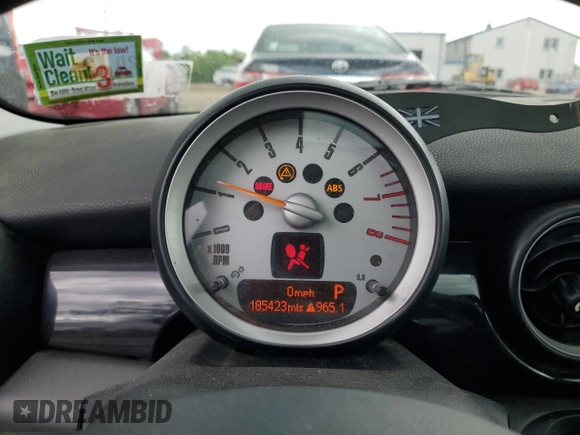 2007 MINI Hardtop S with VIN WMWMF73557TL90986, listed as a Copart auction lot 57850585 with 185,423 mi miles and Salvage title. Bid and sale history available at DreamBid. Image 9.