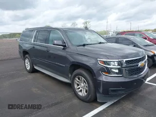2015 Chevrolet Suburban LT with VIN 1GNSCJKC0FR556639, listed as a IAAI auction lot 41924164 with 142,918 mi miles. Bid and sale history available at carsss.com. Image 1.