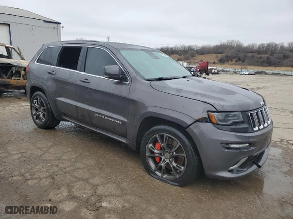 2015 Jeep Grand Cherokee SRT with VIN 1C4RJFDJ8FC752210, listed as a Copart auction lot 45694094 with 76,721 mi miles and Salvage Title. Bid and sale history available at carsss.com. Image 4.