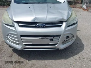 2013 Ford Escape SEL with VIN 1FMCU0H97DUD95194, listed as a IAAI auction lot 42052786 with 145,616 mi miles. Bid and sale history available at carsss.com. Image 6.