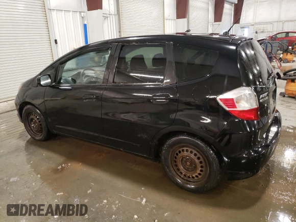 2009 Honda Fit with VIN JHMGE88259S053426, listed as a Copart auction lot 87894815 with 143,665 mi miles and Salvage Title. Bid and sale history available at carsss.com. Image 2.