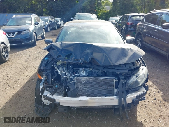 2019 Honda Civic LX with VIN 2HGFC2F65KH549993, listed as a IAAI auction lot 40394538 with 92,951 mi miles and . Bid and sale history available at DreamBid. Image 12.