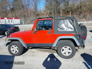 2006 Jeep Wrangler SE with VIN 1J4FA29S16P712101, listed as a IAAI auction lot 41347042 with 129,063 mi miles. Bid and sale history available at carsss.com. Image 14.