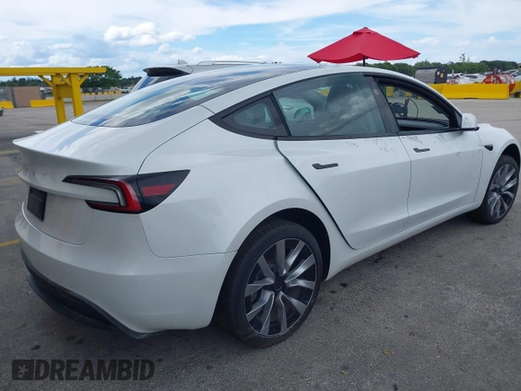 2024 Tesla Model 3 with VIN 5YJ3E1EA6RF751009, listed as a IAAI auction lot 40537919 with Not Provided miles and . Bid and sale history available at DreamBid. Image 4.