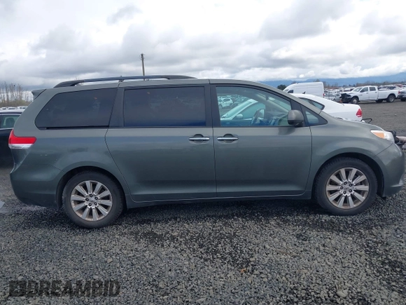 2011 Toyota Sienna XLE with VIN 5TDDK3DCXBS003666, listed as a IAAI auction lot 41807992 with 156,699 mi miles. Bid and sale history available at carsss.com. Image 13.