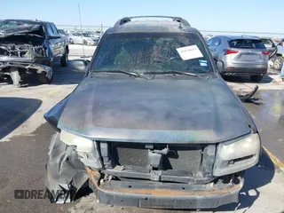 2006 Chevrolet TrailBlazer LS with VIN 1GNES16S066128752, listed as a IAAI auction lot 41830619 with 182,729 mi miles. Bid and sale history available at carsss.com. Image 6.