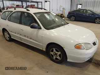 1999 Hyundai Elantra with VIN KMHJW25F5XU142550, listed as a IAAI auction lot 42674012 with 189,211 mi miles and . Bid and sale history available at DreamBid. Image 1.