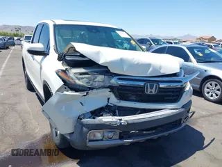 2019 Honda Ridgeline RTL-E with VIN 5FPYK3F74KB009279, listed as a IAAI auction lot 42348773 with 98,141 mi miles and . Bid and sale history available at DreamBid. Image 6.
