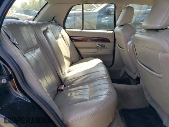 2010 Mercury Grand Marquis LS z VIN 2MEBM7FV8AX618001, wystawiony jako Copart lot #55382305 z przebiegiem 209 814 mil mil oraz Tytuł czysty. Historia ofert i sprzedaży dostępna na DreamBid. Obrazek 10.