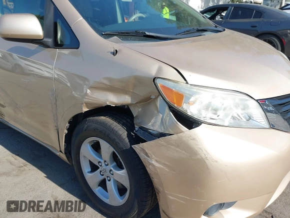 2012 Toyota Sienna LE AAS with VIN 5TDKK3DC5CS186077, listed as a IAAI auction lot 40265988 with 130,888 mi miles and . Bid and sale history available at DreamBid. Image 6.