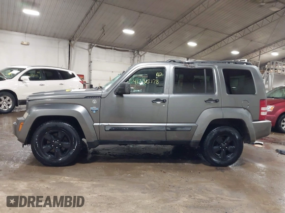 2012 Jeep Liberty Sport Latitude with VIN 1C4PJMAK3CW125398, listed as a IAAI auction lot 41395178 with 142,898 mi miles. Bid and sale history available at carsss.com. Image 14.