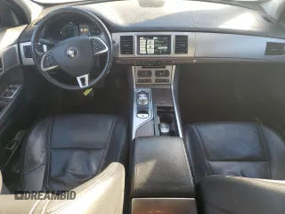 2015 Jaguar XF with VIN SAJXA0FS5FPU49437, listed as a Copart auction lot 84757254 with 99,301 mi miles and Salvage Title. Bid and sale history available at DreamBid. Image 8.