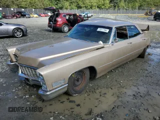 1967 Cadillac DeVille z VIN 87168311, wystawiony jako Copart lot #53429475 z przebiegiem 89 359 mil mil oraz Nie do naprawy • Non repairable. Historia ofert i sprzedaży dostępna na DreamBid. Obrazek 1.
