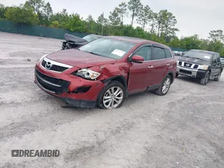 2012 Mazda CX-9 Grand Touring with VIN JM3TB2DA8C0350347, listed as a IAAI auction lot 42214763 with 281,114 mi miles and . Bid and sale history available at DreamBid. Image 2.
