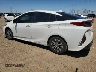 2022 Toyota Prius LE z VIN JTDKAMFP8N3197278, wystawiony jako Copart lot #55828765 z przebiegiem 122 709 mil mil oraz Szkoda całkowita • Salvage title. Historia ofert i sprzedaży dostępna na DreamBid. Obrazek 2.