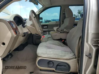 2007 Ford F-150 XLT with VIN 1FTPW12V77FA65348, listed as a Copart auction lot 59727355 with 146,566 mi miles and Salvage title. Bid and sale history available at DreamBid. Image 7.