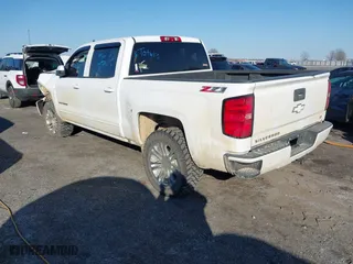 2016 Chevrolet Silverado 1500 LT with VIN 3GCUKREC6GG306239, listed as a IAAI auction lot 41380251 with 128,042 mi miles. Bid and sale history available at carsss.com. Image 3.