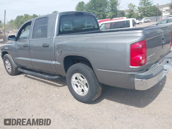 2006 Dodge Dakota SLT with VIN 1D7HE48N06S580705, listed as a IAAI auction lot 42120728 with 206,420 mi miles. Bid and sale history available at carsss.com. Image 3.