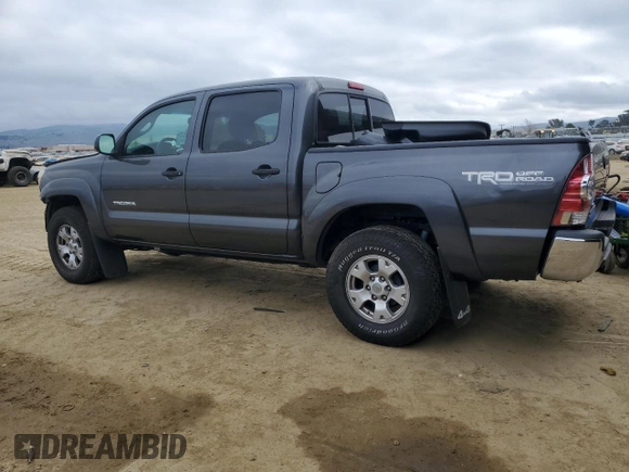 2013 Toyota Tacoma with VIN 3TMLU4EN5DM104791, listed as a Copart auction lot 43207965 with 121,427 mi miles and Salvage Title. Bid and sale history available at DreamBid. Image 2.