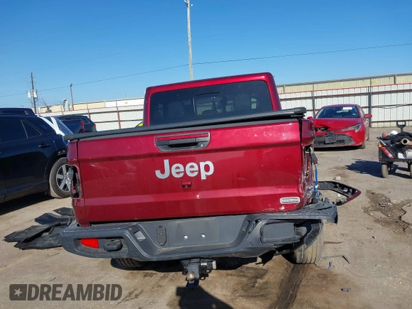 2021 Jeep Gladiator Overland z VIN 1C6HJTFGXML595781, wystawiony jako IAAI lot #41667696 z przebiegiem 31 438 mil mil oraz . Historia ofert i sprzedaży dostępna na DreamBid. Obrazek 16.