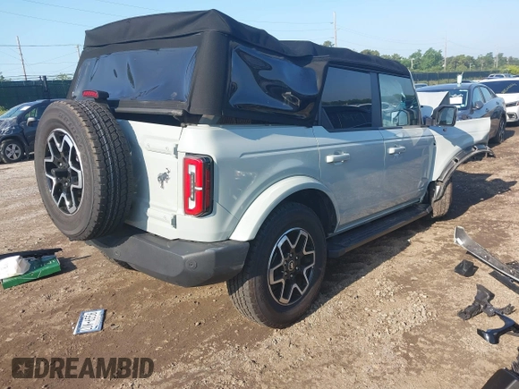 2022 Ford Bronco with VIN 1FMEE5DP7NLA78997, listed as a IAAI auction lot 42462203 with 20,253 mi miles and . Bid and sale history available at DreamBid. Image 4.