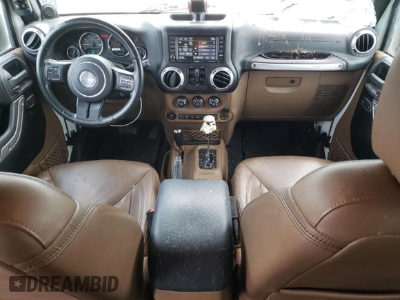 2013 Jeep Wrangler Unlimited Sahara with VIN 1C4HJWEG9DL628684, listed as a Copart auction lot 57672175 with 69,010 mi miles and Salvage title. Bid and sale history available at DreamBid. Image 8.