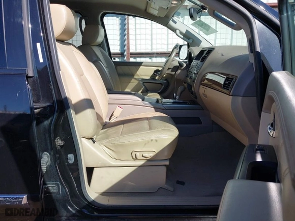 2015 Nissan Armada SV with VIN 5N1BA0ND0FN620176, listed as a IAAI auction lot 41665275 with 128,277 mi miles. Bid and sale history available at carsss.com. Image 5.
