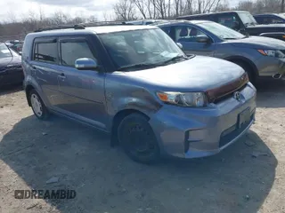 2012 Scion xB with VIN JTLZE4FE2CJ022796, listed as a IAAI auction lot 41867520 with 166,371 mi miles. Bid and sale history available at carsss.com. Image 1.