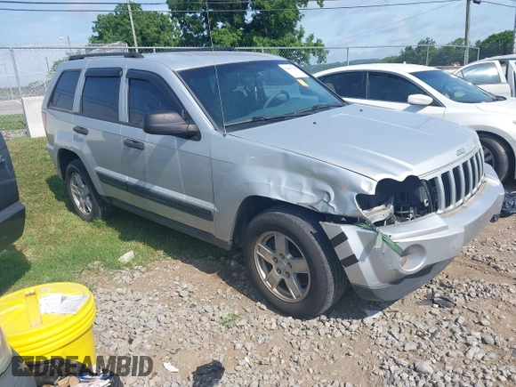 2006 Jeep Grand Cherokee Laredo with VIN 1J4GS48K56C260532, listed as a IAAI auction lot 42607110 with 153,110 mi miles and . Bid and sale history available at DreamBid. Image 1.