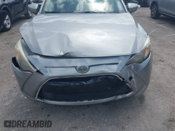 2016 Scion iA z VIN 3MYDLBZV4GY133476, wystawiony jako IAAI lot #42115431 z przebiegiem 112 087 mil mil oraz . Historia ofert i sprzedaży dostępna na DreamBid. Obrazek 6.