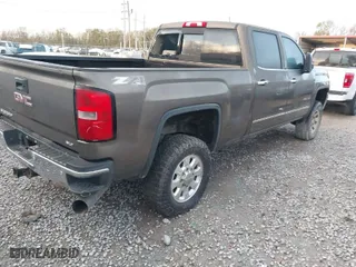 2015 GMC Sierra 2500HD SLT with VIN 1GT12ZE84FF168621, listed as a IAAI auction lot 41320970 with 292,164 mi miles. Bid and sale history available at carsss.com. Image 4.