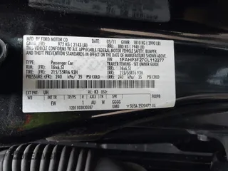 2012 Ford Focus SE with VIN 1FAHP3F27CL112277, listed as a IAAI auction lot 42053243 with 104,885 mi miles. Bid and sale history available at carsss.com. Image 9.