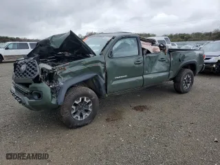 2021 Toyota Tacoma 4WD SR5 with VIN 3TMDZ5BNXMM099474, listed as a Copart auction lot 49325385 with 57,853 mi miles and Salvage Title. Bid and sale history available at carsss.com. Image 1.