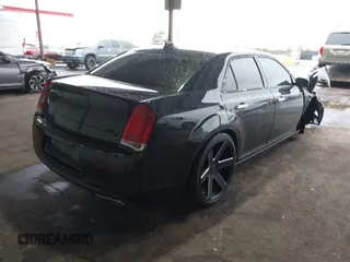 2016 Chrysler 300 with VIN 2C3CCAEG3GH348420, listed as a IAAI auction lot 41092322 with 111,929 mi miles. Bid and sale history available at carsss.com. Image 4.