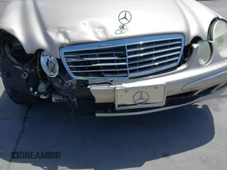 2003 Mercedes-Benz E 320 with VIN WDBUF65J13A343353, listed as a IAAI auction lot 42100070 with 111,880 mi miles and . Bid and sale history available at carsss.com. Image 6.
