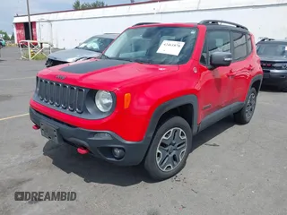 2015 Jeep Renegade Trailhawk with VIN ZACCJBCT7FPB80933, listed as a IAAI auction lot 42461878 with 138,803 mi miles and . Bid and sale history available at DreamBid. Image 2.