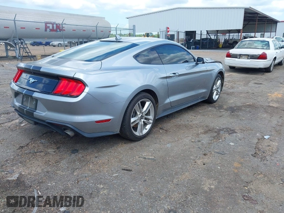 2021 Ford Mustang EcoBoost z VIN 1FA6P8TH1M5121107, wystawiony jako IAAI lot #42204097 z przebiegiem 51 542 mil mil oraz . Historia ofert i sprzedaży dostępna na DreamBid. Obrazek 4.