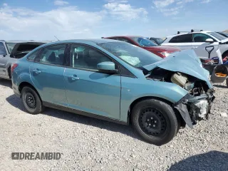 2012 Ford Focus SE with VIN 1FAHP3F24CL163896, listed as a Copart auction lot 61651015 with Not provided miles and Salvage title. Bid and sale history available at DreamBid. Image 4.