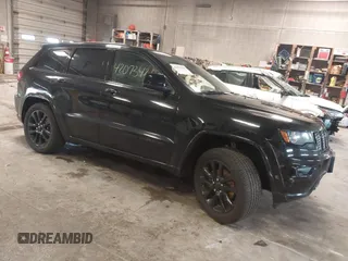 2018 Jeep Grand Cherokee Laredo E with VIN 1C4RJFAG4JC298393, listed as a IAAI auction lot 42073426 with 145,386 mi miles. Bid and sale history available at carsss.com. Image 1.